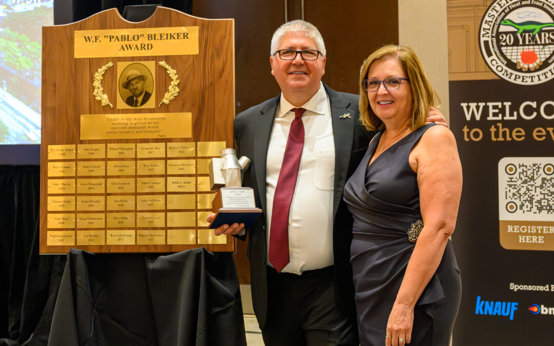 Recipient holding the W.F. "Pablo" Bleiker Award at the Master Apprentice Competition dinner in Orlando.